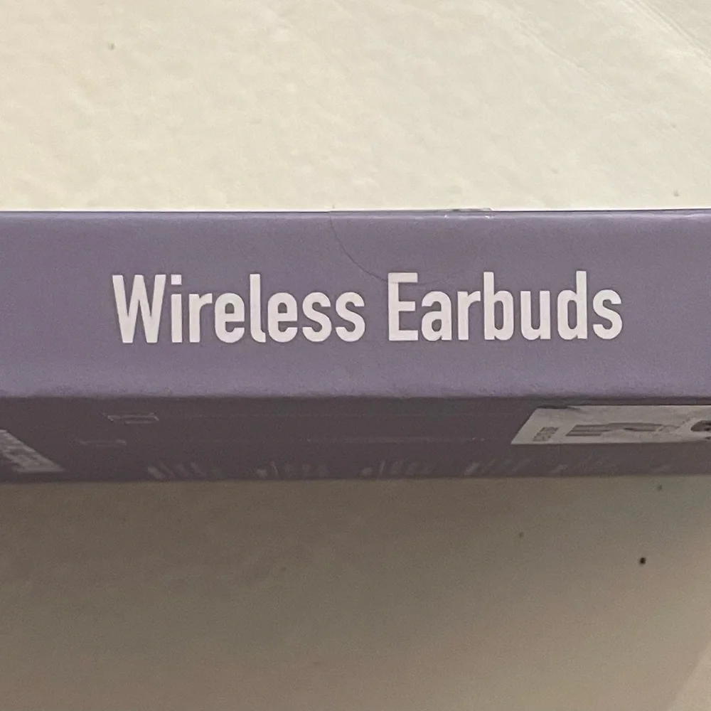 Wireless Bluetooth Earbuds in Purple-Brand New. Sealed.